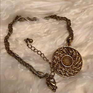 Swirl brass pendant necklace